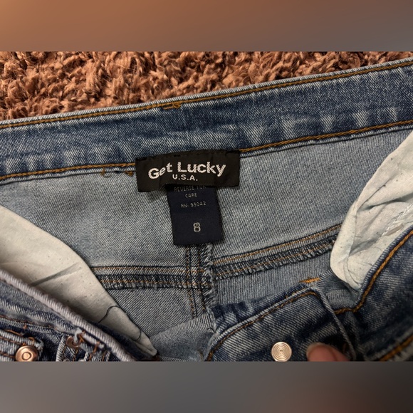 Stylish Blue Flare Jeans with Gold Detailing - Picture 3 of 3